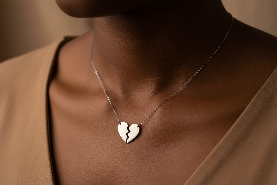 Silver broken heart pendant necklace on model, minimalist jewelry for everyday wear