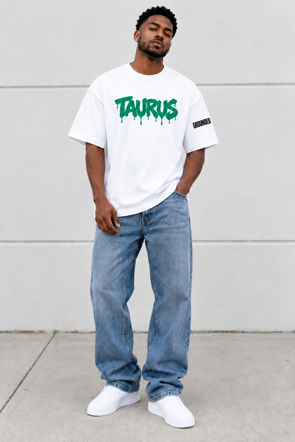 Taurus mockup with Grounded on the wearer’s left sleeve